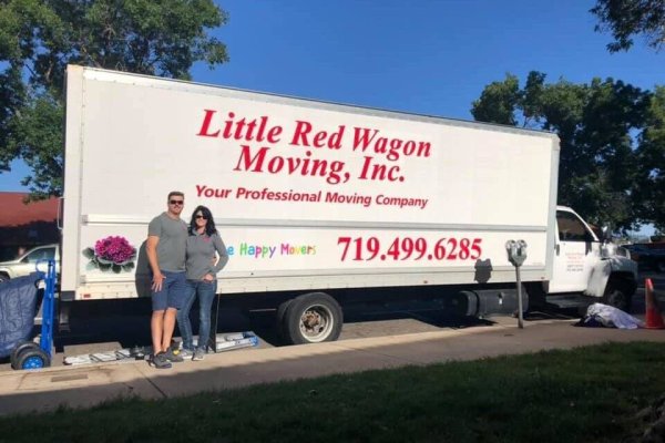 A picture of a moving truck and fitness equipment movers.